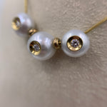 Galatea Diamond in a Triple Pearl Necklace